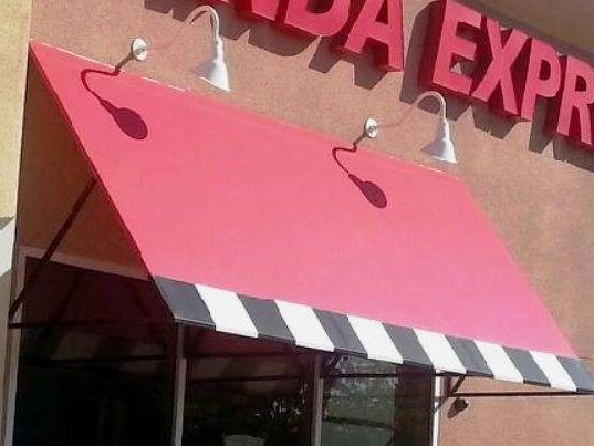 Storefront awning cleaning in Fresno, CA